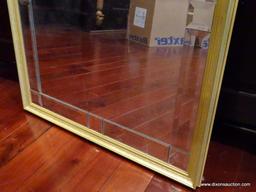 (LIBRARY) GOLD TONE FRAMED WALL MIRROR; BEVELED SECTIONS ALONG THE INSIDE OF THE FRAME. MEASURES