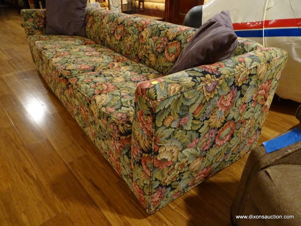 (BDEN) VINTAGE FLORAL UPHOLSTERED THREE CUSHION SOFA; SHORT ROLLED BACK & SIDES. DOES HAVE SOME WEAR