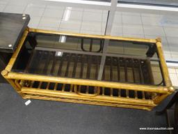 (WINDOW) COFFEE TABLE; GLASS TOP WOODEN COFFEE TABLE WITH RATTAN BOUND JOINTS AND LOWER SHELF