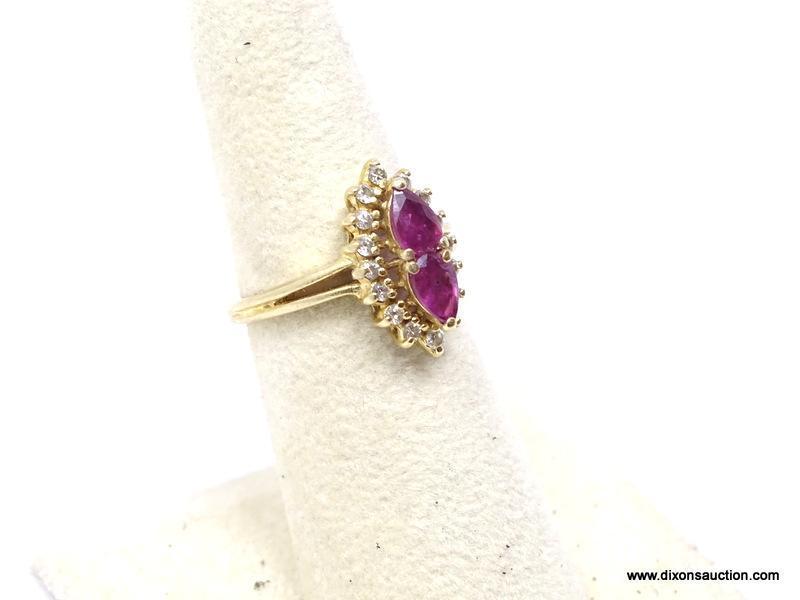 LADIES 14K RUBY AND DIAMOND RING; 14K YELLOW GOLD RING WITH MARQUISE CUT RUBY IN THE CENTER