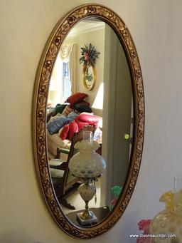 (FOYER) MIRROR; COMPOSITE GOLD OVAL MIRROR, WITH DOGWOOD AND OAK LEAF PATTERN- 19 IN X 37 IN