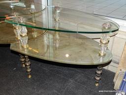 (WINDOW) TIERED GLASS COFFEE TABLE; 3 PC., OVAL, GLASS COFFEE TABLE WITH 2 ARROW SHAPED PIECES THAT