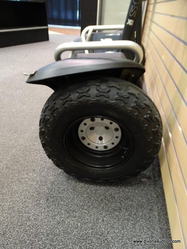 SEGWAY X2 PERSONAL TRANSPORTER; BLACK COLORED, X2 MODEL IS FOR OFF-ROAD USE AND CAN TRAVEL UP TO 12