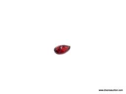 .87 CT PEAR SHAPED GARNET. MEASURES 7MM X 5MM X 3MM.