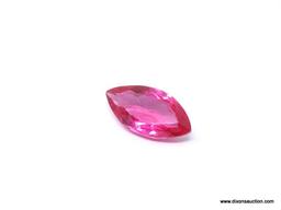 12.72 CT MARQUISE CUT RED TOPAZ. MEASURES 23MM X 12MM X 7MM.