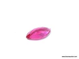 12.72 CT MARQUISE CUT RED TOPAZ. MEASURES 23MM X 12MM X 7MM.