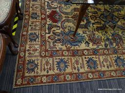 (R1) VINTAGE FLORAL AREA RUG; BLUE, BEIGE, AND RED, FLORAL AND GEOMETRIC PATTERNED, AREA RUG. HAS