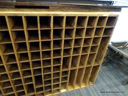 (R1) VINTAGE POST OFFICE MAIL SORTER; OAK MAIL SORTER WITH 180 POTENTIAL SLOTS. MEASURES 76.5" X 16"