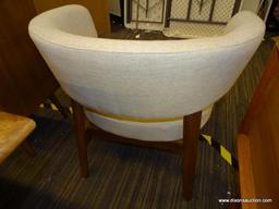 JUNO CHAIR; A WRAPAROUND BACK GIVES MODERN DEFINITION TO OUR JUNO CHAIR, PROVIDING EXTRA COMFORT IN