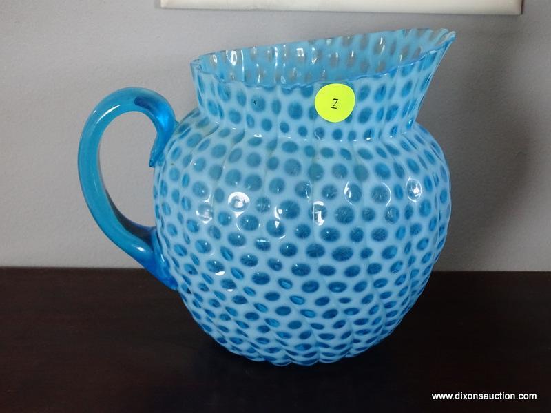 (DR) BLUE GLASS PITCHER; AWESOME, SPIRAL SHAPED GLASS PITCHER. MEASURES 6.5" TALL.