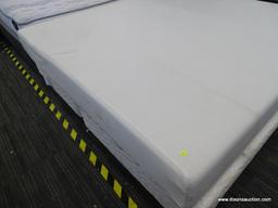 CAL KING FOAM MATTRESS WITH SPLIT BOX SPRING AND METAL BED FRAME.