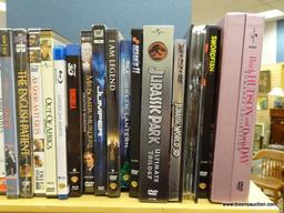 (R2) SHELF LOT OF DVDS; LOT INCLUDES SHERLOCK HOLMES, LOST IN SPACE, JURASSIC PARK, OUT OF AFRICA,