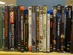 (R2) SHELF LOT OF DVDS; LOT INCLUDES SHERLOCK HOLMES, LOST IN SPACE, JURASSIC PARK, OUT OF AFRICA,