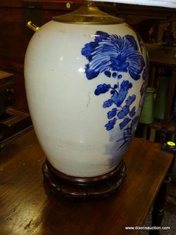 (R2) ORIENTAL LAMP; BLUE AND WHITE ORIENTAL LAMP ON ROSEWOOD BASE WITH CLOTH SHADE- 25 IN H