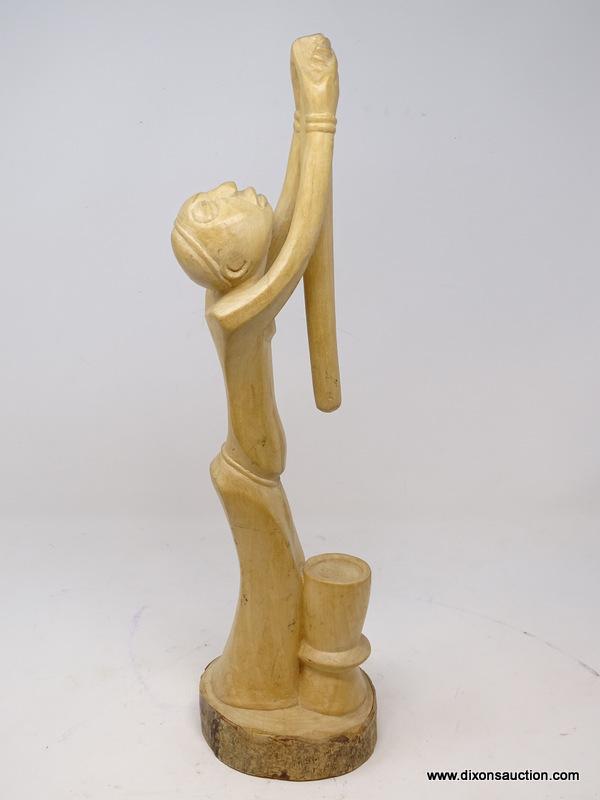 (RFRT) HAND CARVED WOODEN, AFRICAN FIGURINE OF A MAN HOLDING A POLE HIGH IN THE AIR ABOVE A BOWL,