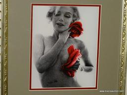 MARILYN MONROE "RED ROSES" FRAMED PHOTOGRAPH; SHOWS A NUDE PHOTO OF MARILYN MONROE HOLDING RED ROSES