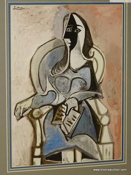 "WOMAN IN CHAIR READING" FRAMED GICLEE BY PABLO PICASSO; DEPICTS AN ABSTRACT WOMAN SITTING AND