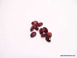 PARCEL BAG OF [10] 6MM X 4MM, RED OVAL GARNETS. 5 TOTAL CARATS.