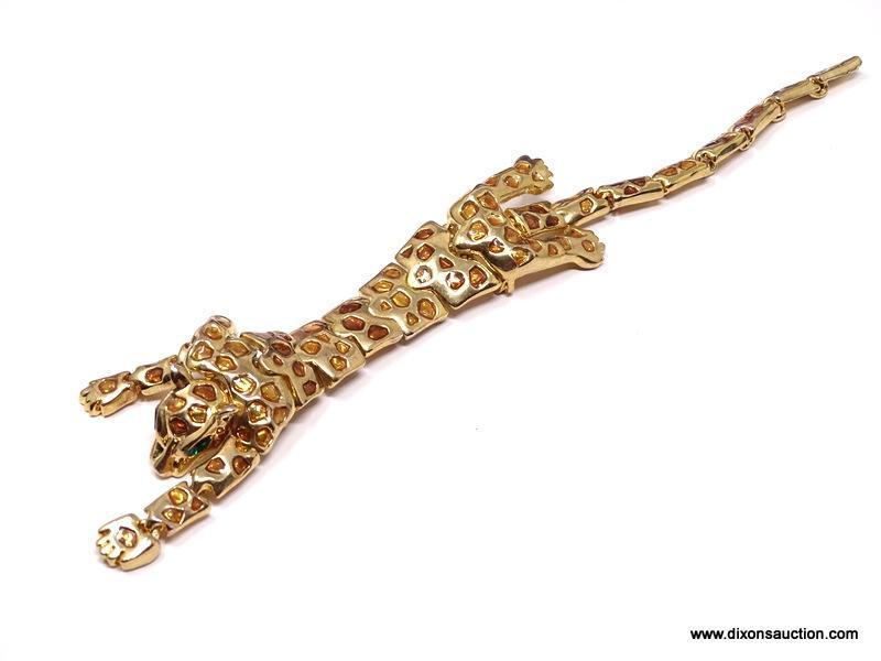 VINTAGE ARTICULATED LEOPARD SHOULDER DRAPE BROOCH/PIN . FEATURES A RICH GOLD TONE BODY, WITH