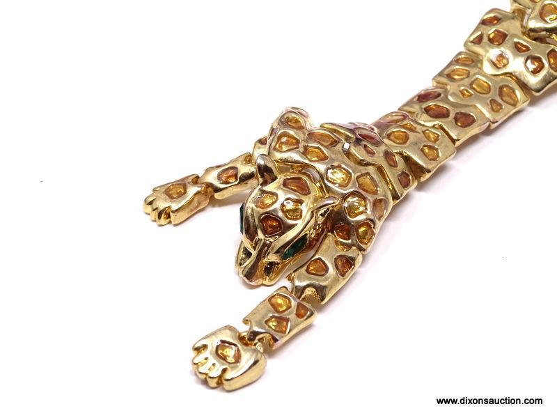 VINTAGE ARTICULATED LEOPARD SHOULDER DRAPE BROOCH/PIN . FEATURES A RICH GOLD TONE BODY, WITH