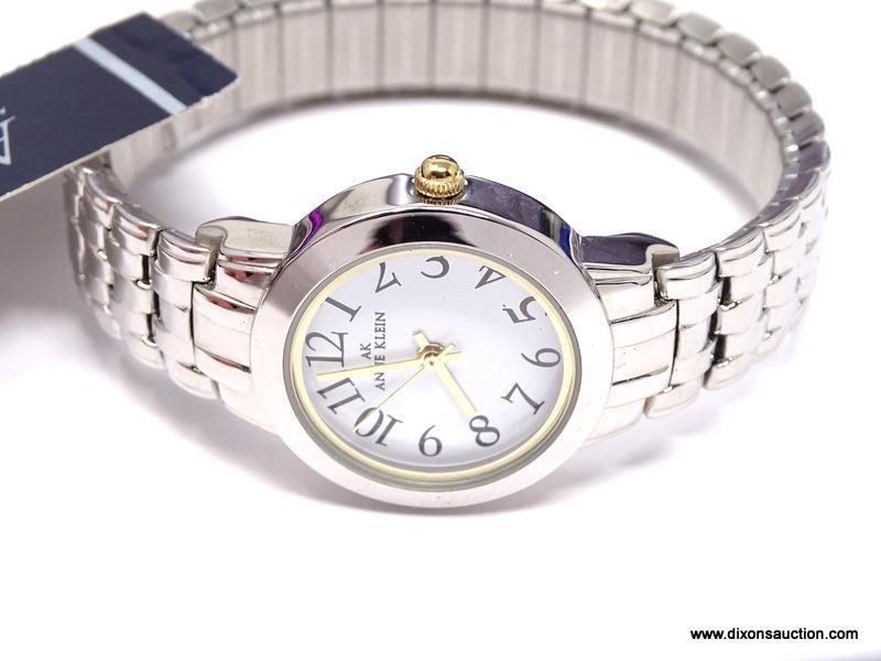ANNE KLEIN LADIES' QUARTZ STAINLESS STEEL WRIST WATCH. NEW, WITH TAG. DIAL FEATURES LARGE, EASY TO