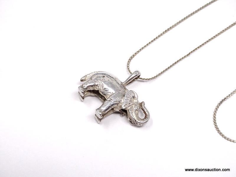 STERLING SILVER, GOOD LUCK ELEPHANT PENDANT, SUSPENDED FROM AN 18" SERPENTINE CHAIN. IN MANY