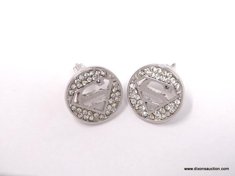 COLLECTIBLE DC COMICS SUPERMAN SILVER TONE AND CRYSTAL POST EARRINGS. THE 5/8" ROUND PAIR FEATURE