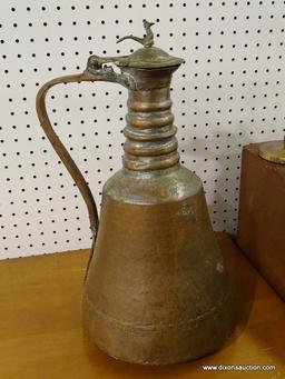 (R1) HAMMERED PITCHER; ANTIQUE HAMMERED COPPER PITCHER WITH BRASS LID. HAS WEAR. MEASURES 18" TALL.