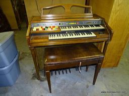 (GARAGE) ELECTRIC ORGAN; HAMMOND OAK CONSOLE ELECTRIC ORGAN WITH BENCH- 43 IN X 24 IN X 36 IN,