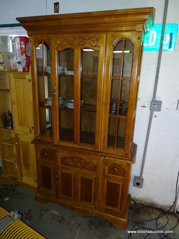 (GARAGE) CHINA CABINET; OAK 2 PC. CHINA CABINET- 1 CENTER CARVED AND GLASS DOOR WITH SIDELIGHTS, 2