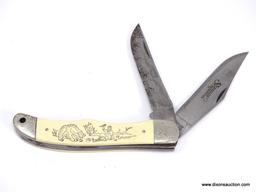 SCHRADE SCRIMSHAW FOLDING HUNTER IS A 5 1/4" CLOSED KNIFE WITH A HEAVY DUTY BONING AND CLIP BLADE