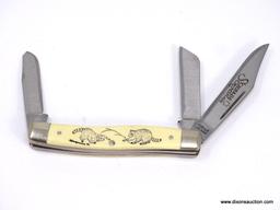 SCHRADE SCRIMSHAW STOCKMANS PATTERN IS A 4" CLOSED , SQUARE BOLSTER PATTERN THAT CONTAINS CLIP, SPEY