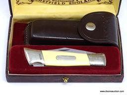 SCHRADE WOSTENHOLM I-XL 4 3/4" CLOSED BLADE NO. N 40 KNIFE WITH IVORY WHITE MICARTA HANDLE. COMES IN