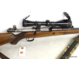 BELGIUM MAUSER BOLT ACTION .30-06 CALIBER WITH DETAILED STOCK. SERIAL #27327. COMES WITH LEUPOLD 3X9