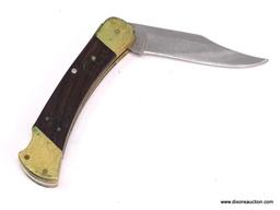 BUCK 110 LOCKBACK FOLDING KNIFE WITH 3 3/4" BLADE AND CRELICAM GENUINE EBONY HANDLE. COMES WITH