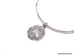 DESIGNER SIGNED, STERLING SILVER WAVY BANGLE BRACELET WITH STERLING SILVER SAND DOLLAR CHARM.