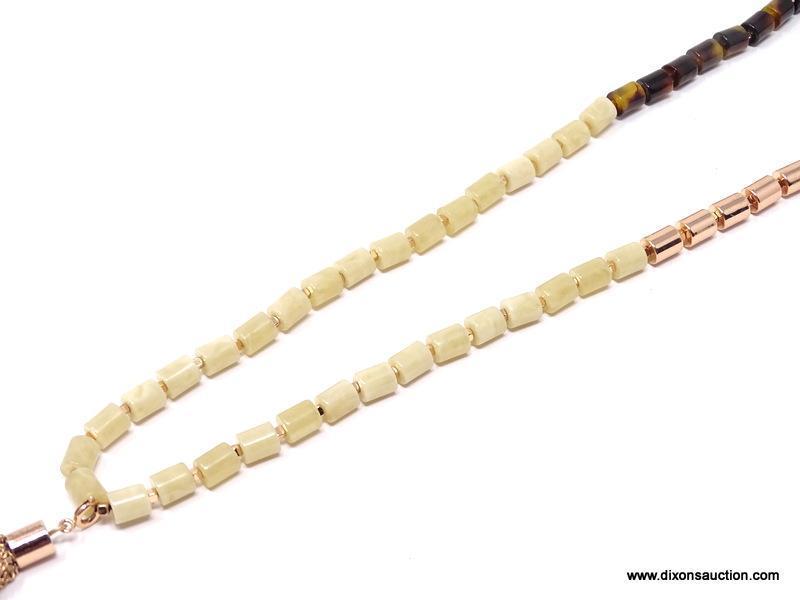 FOSSIL ROSE GOLD BEADED NECKLACE. FEATURES TORTOISE SHELL AND AGATE BARRELL BEADS, ENHANCED WITH