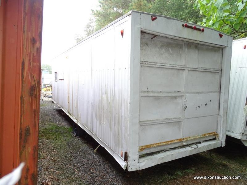 WHITE CONTRACTOR OFFICE TRAILER. RUSTED. PLEASE PREVIEW FOR CONDITION. COME PREPARED TO MOVE IT.