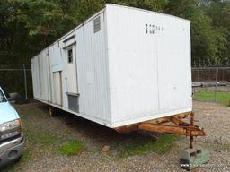 WHITE CONTRACTOR OFFICE TRAILER. RUSTED. PLEASE PREVIEW FOR CONDITION. COME PREPARED TO MOVE IT.