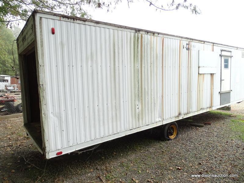 WHITE CONTRACTOR OFFICE TRAILER. RUSTED. PLEASE PREVIEW FOR CONDITION. COME PREPARED TO MOVE IT.