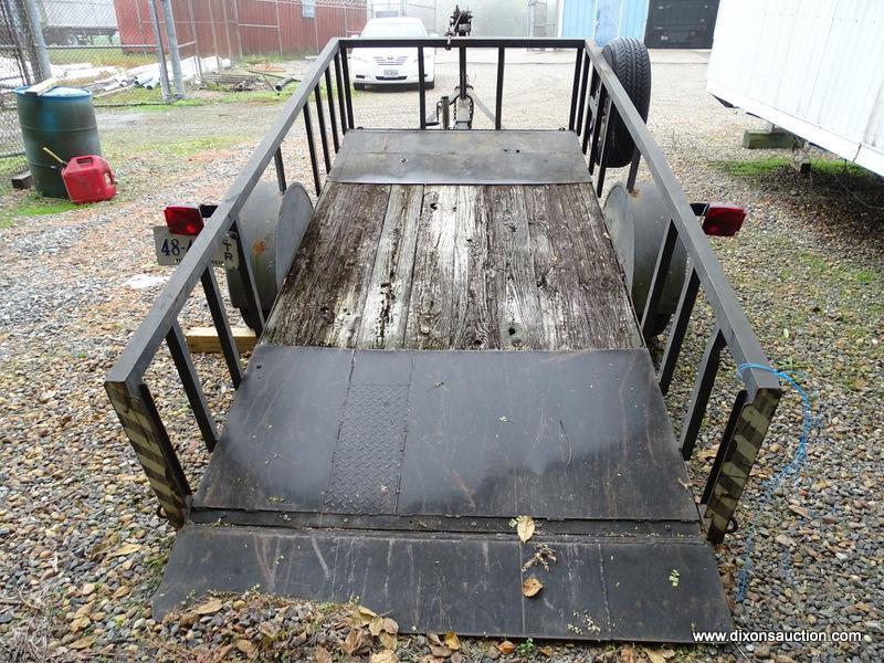 10' X 5' BLACK PULL BEHIND UTILITY TRAILER WITH RAMP. COMES WITH WINCH AND SPARE TIRE. MEASURES 15'