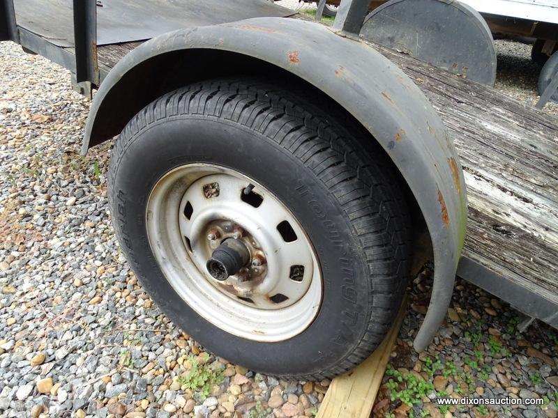 10' X 5' BLACK PULL BEHIND UTILITY TRAILER WITH RAMP. COMES WITH WINCH AND SPARE TIRE. MEASURES 15'