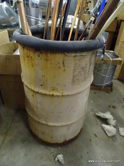 METAL DRUM FILLED WITH OVER 20 PIECES OF COPPER TUBING PIPE. ASSORTED SIZES AND LENGTHS.