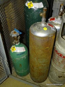 LOT OF (9) ASSORTED GAS BOTTLES. COMPRESSED OXYGEN AND ACETYLENE.