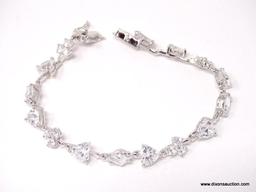 .925 STERLING SILVER HEART, CLUB & DIAMOND CZ BRACELET FROM THE SUZANNE SOMERS COLLECTION. MEASURES