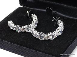 PAIR OF .925 STERLING SILVER & LARGE CZ "C" PIERCED EARRINGS. REAL COLLECTIBLES BY ADRIENNE. COMES