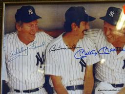 SIGNED NEW YORK YANKEES PHOTOGRAPH; SHOWS WHITEY FORD, BILLY MARTIN, AND MICKEY MANTLE SITTING