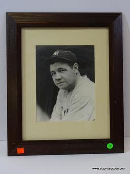 BLACK AND WHITE NEW YORK YANKEES PHOTOGRAPH; IS OF BABE RUTH. IS IN A MAHOGANY FRAME AND MEASURES 14