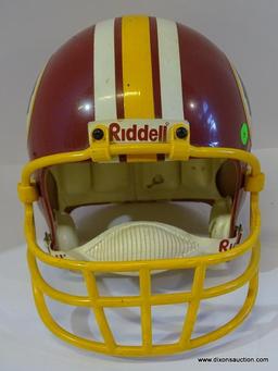 TROPHY HELMET; REDSKINS FOOTBALL TROPHY HELMET IN BURGUNDY, YELLOW, AND WHITE. NOT TO BE USED IN