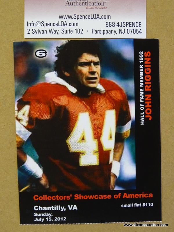 SIGNED REDSKINS PHOTOGRAPH; PHOTO IS OF AND IS SIGNED BY JOHN RIGGINS. IS AN 8 IN X 10 IN PHOTOGRAPH